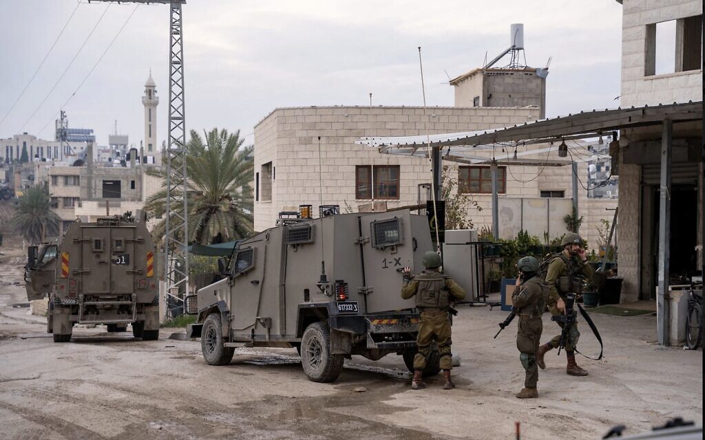 IDF troops operate in the West Bank city of Tulkarem, February 3, 2025. (Emanuel Fabian/Times of Israel)