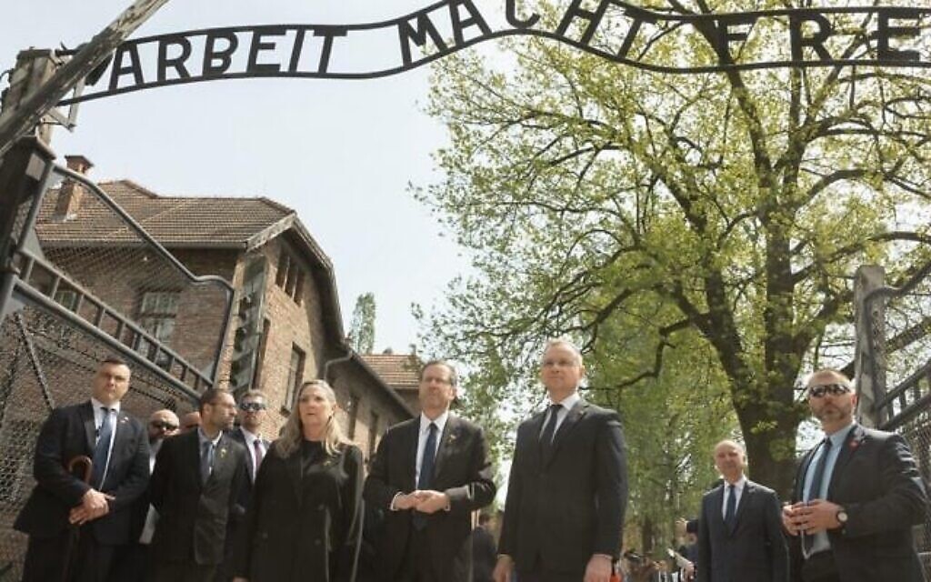 Polish President Andrzej Duda (right), President Isaac Herzog (center) and Michal Herzog attend March of the Living at Auschwitz on April 24, 2025. (Chen Schimmel/March of the Living, via The Times of Israel)