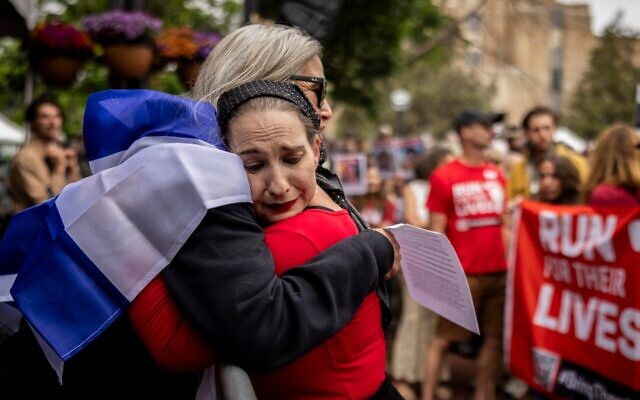 Rachel Amaru, an organizer for Run for Their Lives in Boulder, embraces Rachel Cohen, who was at the June 1 attack, on June 8, 2025, in Boulder, Colorado. (Chet Strange/Getty Images) Rachel Amaru, an organizer for Run for Their Lives in Boulder, embraces Rachel Cohen, who was at the June 1 attack, on June 8, 2025, in Boulder, Colorado. (Chet Strange/Getty Images)