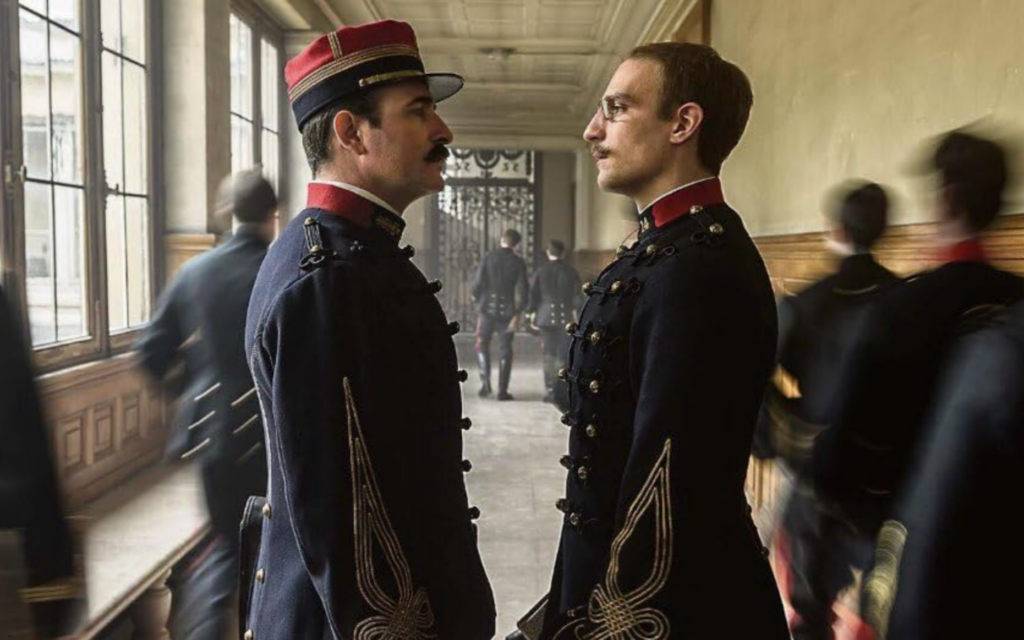 Jean Dujardin, left, as Georges Picquart and Louis Garrel as Alfred Dreyfus star in Roman Polanski's "An Officer and a Spy." (IMDB via JTA)