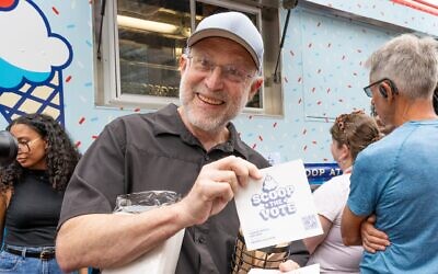 Jerry Greenfield, co-founder of Ben & Jerry’s, partnered with MoveOn to hand out free ice cream at Franklin Square in Philadelphia during their Scoop The Vote tour to get-out-the-vote for Vice President Kamala Harris and Democrats down the ballot. on September 16, 2024 in Philadelphia, Pennsylvania. (Lisa Lake/Getty Images for MoveOn)