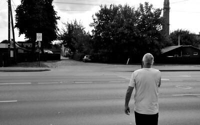 Fox Chapel resident Mario Czonstkowsky heads toward his mother's and grandparents' former street in Kaunas, Lithuania. (Photo by Adam Reinherz)