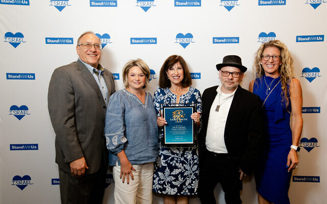 Julie Paris , SWU Mid-Atlanitc regional director (right) with the Chronicle staff, from left: Jim Busis, Amy Weiss, Toby Tabachnick and David Rullo (Adam Reinherz not pictured) (Photo by Christina Montemurro Photography) Julie Paris , SWU Mid-Atlanitc regional director (right) with the Chronicle staff, from left: Jim Busis, Amy Weiss, Toby Tabachnick and David Rullo (Adam Reinherz not pictured) (Photo by Christina Montemurro Photography)