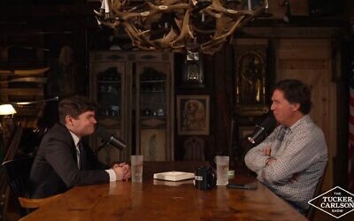 Nick Fuentes sits down for an interview with Tucker Carlson, Oct. 28, 2025. (Screenshot)