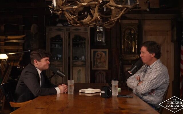 Nick Fuentes sits down for an interview with Tucker Carlson, Oct. 28, 2025. (Screenshot)