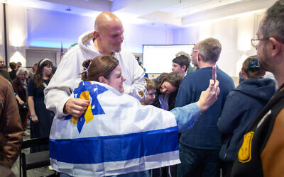 Sen. John Fetterman takes a photo with a community member at the  Oct. 7 commemoration event held at the Jewish Community Center of Greater Pittsburgh, Squirrel Hill, on Oct. 12, 2025 (Photo by Joshua Franzos)