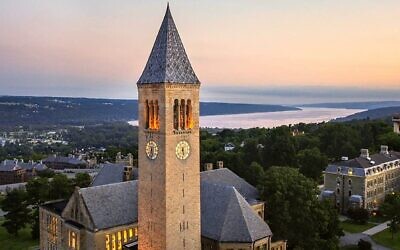 McGraw Tower and Uris Library at Cornell University in Ithaca, N.Y., with Morrill Hall and Cayuga Lake in the background. (Credit: Dantes De MonteCristo via Wikimedia Commons)