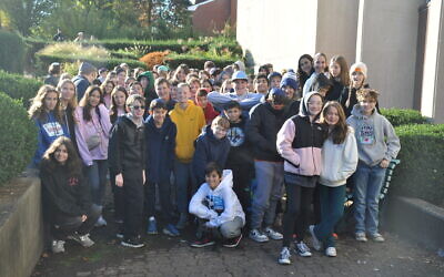Students from Community Day School and  Joseph and Florence Mandel Jewish Day School gather outside the Tree of Life building for a joint commemoration on Oct. 27, 2025. (Photo by Adam Reinherz)