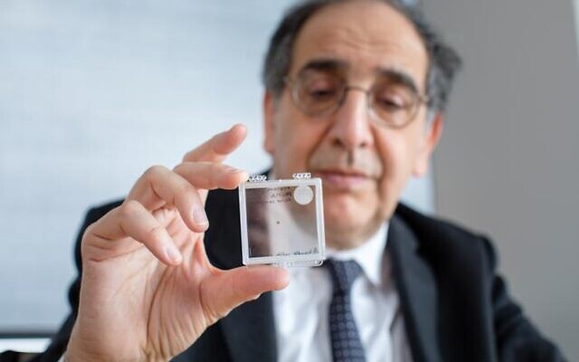 Dr. José-Alain Sahel holds the PRIMA implant. (Photo courtesy of UPMC) Dr. José-Alain Sahel holds the PRIMA implant. (Photo courtesy of UPMC)