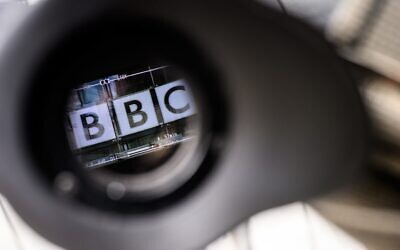 The logo on the front of BBC Broadcasting House is seen through a television camera viewfinder in London on July 10, 2023. (Photo by Leon Neal/Getty Images)