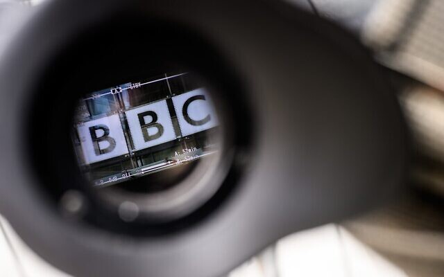 The logo on the front of BBC Broadcasting House is seen through a television camera viewfinder in London on July 10, 2023. (Photo by Leon Neal/Getty Images)
