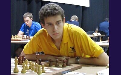 Daniel Naroditsky playing in a chess tournament in 2016. (Wikimedia Commons)