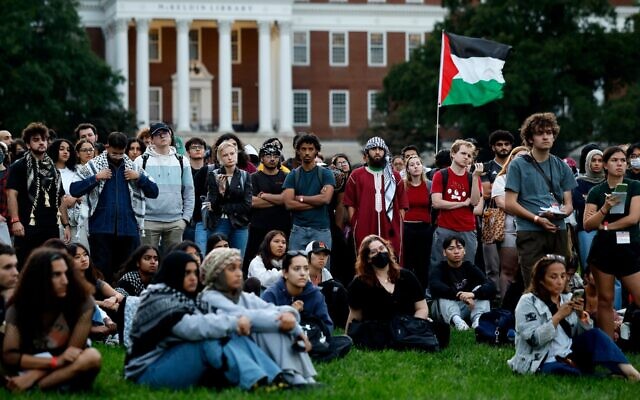 Attendees listen as names of Palestinian infants killed in the war in Gaza are read aloud during a vigil organized by the Students for Justice in Palestine at the University of Maryland campus on October 07, 2024 in College Park, Maryland. (Chip Somodevilla/Getty Images) Attendees listen as names of Palestinian infants killed in the war in Gaza are read aloud during a vigil organized by the Students for Justice in Palestine at the University of Maryland campus on October 07, 2024 in College Park, Maryland. (Chip Somodevilla/Getty Images)