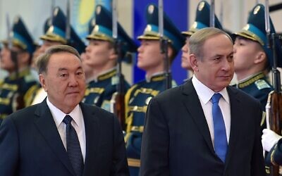 Then-Kazakh President Nursultan Nazarbayev, left, and Israeli Prime Minister Benjamin Netanyahu inspect honor guards during their meeting in Astana, Kazakhstan on Dec. 14, 2016. (Ilyas Omarov/AFP via Getty Images)