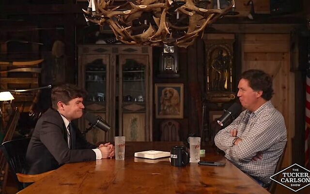 Nick Fuentes sits down for an interview with Tucker Carlson, Oct. 28, 2025. (Screenshot)