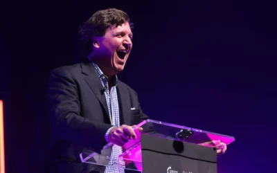 Tucker Carlson speaking with attendees at the Indiana University tour stop of the "This Is The Turning Point" tour at IU Auditorium in Bloomington, Ind., Oct. 21, 2025. (Credit: Gage Skidmore via Creative Commons)