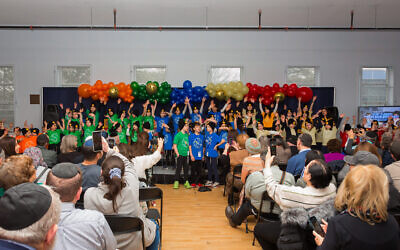 Students participate in a Dec. 25 program honoring Shirley Dorsey's impact at Hillel Academy of Pittsburgh. (Photo by Tzvi Friedman)