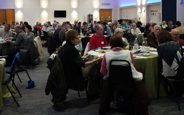 Community members gather at the Jewish Community Center in Squirrel Hill for a pre-Passover seder with the Center for Loving Kindness and Civic Engagement. (Photo courtesy of Jewish Community Center of Greater Pittsburgh) Community members gather at the Jewish Community Center in Squirrel Hill for a pre-Passover seder with the Center for Loving Kindness and Civic Engagement. (Photo courtesy of Jewish Community Center of Greater Pittsburgh)