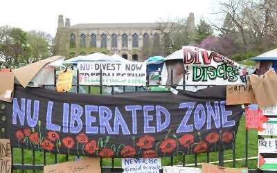 Students and residents camp outside Northwestern University during a pro-Palestinian protest, expressing solidarity with Palestinians with banners in Evanston, Illinois, United States on April 27, 2024. (Jacek Boczarski/Anadolu via Getty Images)