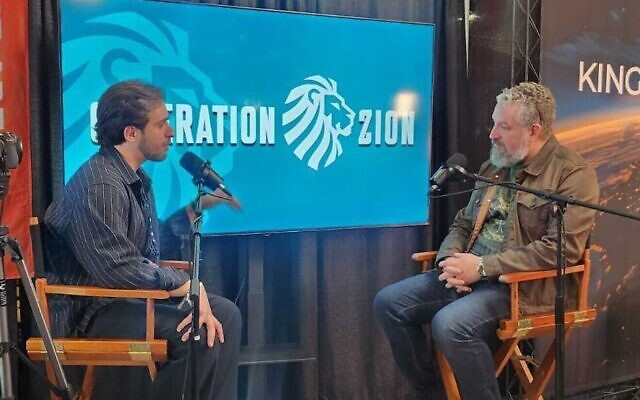 Liberated hostage Omer Shem Tov speaks with Luke Moon, of Generation Zion, at Turning Point USA's America Fest event in Phoenix, Dec. 19, 2025. (Photo by Audrey Hoffman) Liberated hostage Omer Shem Tov speaks with Luke Moon, of Generation Zion, at Turning Point USA's America Fest event in Phoenix, Dec. 19, 2025. (Photo by Audrey Hoffman)