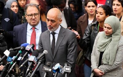 The legal team of Mahmoud Khalil, Ramzi Kassem (center) and Baher Amzy (left) speak to the press outside of the Thurgood Marshall Courthouse, where a hearing is underway regarding Khalil's arrest, in New York City on March 12, 2025. (Photo by Charly Triballeau/AFP via Getty Images)