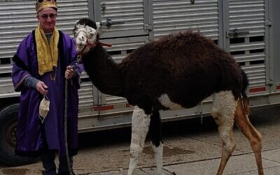 Alan Hausman as a wise man with a camel (Photo by Ken Smith)