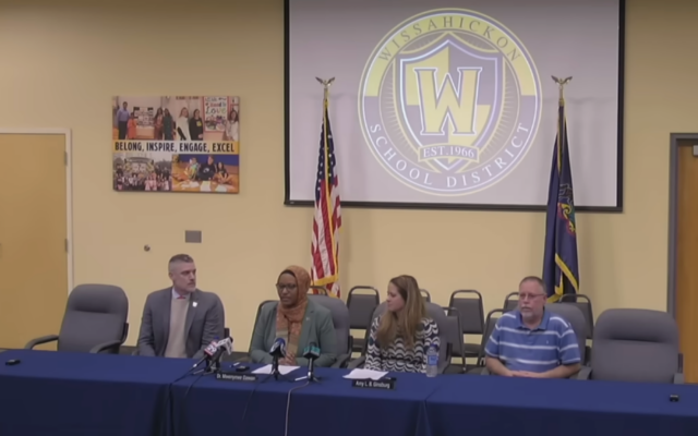 Wissahickon Superintendent of Schools Mwenyewe Dawan, second from left, and School Board President Amy Ginsburg, third from left, speak at a press conference on Dec. 19, 2025. (Screenshot) Wissahickon Superintendent of Schools Mwenyewe Dawan, second from left, and School Board President Amy Ginsburg, third from left, speak at a press conference on Dec. 19, 2025. (Screenshot)