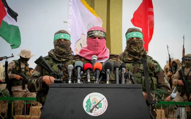 Abu Ubaida (center), a spokesman for Hamas’s military wing, speaks in the southern Gaza town of Rafah on Jan. 31, 2017. (Credit: Abed Rahim Khatib/Flash90, via JNS) Abu Ubaida (center), a spokesman for Hamas’s military wing, speaks in the southern Gaza town of Rafah on Jan. 31, 2017. (Credit: Abed Rahim Khatib/Flash90, via JNS)