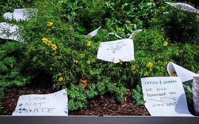 A memorial for the two Israeli embassy staffers, Sarah Milgrim, 26, and Yaron Lischinsky, 30, who were shot and killed as they left an event at the Capital Jewish Museum in Washington, D.C., May 22, 2025. (Photo credit: Ted Eytan via Wikimedia Commons)