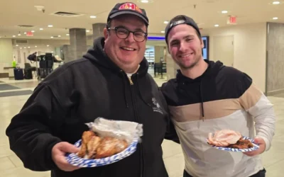 Stranded travelers diverted to Minneapolis-St. Paul International Airport as a result of a snowstorm that gripped the United States enjoy kosher food courtesy of Chabad, Jan. 24-25, 2026. (Credit: Courtesy of Chabad of Minnesota)