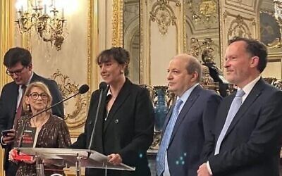 Nora Bussigny at the podium of the French Senate as she receives the 2025 Prix Edgar Faure for best political book of the year. (Photo courtesy of Nora Bussigny)