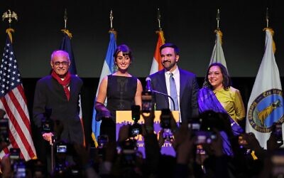 New York City Mayoral candidate Zohran Mamdani  (2nd R) celebrates alongside his wife Rama Duwaji (2nd L), his parents Mahmood Mamdani (L) and Mira Nair during an election night event at the Brooklyn Paramount Theater in Brooklyn, New York on November 4, 2025. (ANGELA WEISS / AFP)