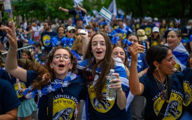 Participants cheer and dance during the Celebrate Israel Parade up Fifth Avenue on May 18, 2025 in New York City. (Alexi Rosenfeld/Getty Images)