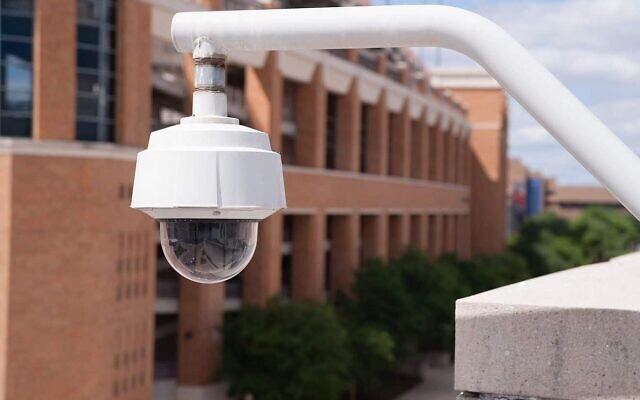 A video security camera mounted high on a college campus. (Credit: Real Window Creative/Shutterstock) A video security camera mounted high on a college campus. (Credit: Real Window Creative/Shutterstock)