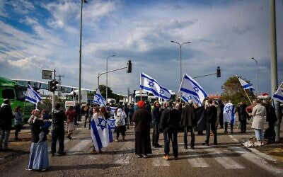 Tzav 9 activists block the entrance to Ashdod Port during a protest against aid trucks entering the Gaza Strip, Feb. 1, 2024. (Photo by Chaim Goldberg/Flash90, via JNS)