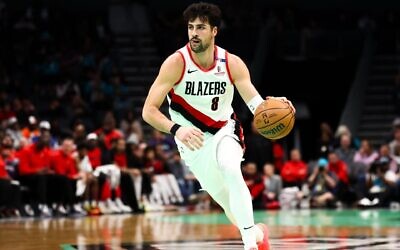 Deni Avdija drives to the basket against the Charlotte Hornets at Spectrum Center, Jan. 24, 2025, in Charlotte. (David Jensen/Getty Images)