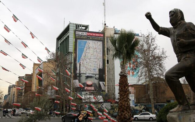 A giant billboard displaying a map of potential targets in Israel's Tel Aviv area along with a warning message reading "You start, we finish!" is seen at Palestine Square in Tehran, Iran, Feb. 9, 2026. (Fatemeh Bahrami/Anadolu via Getty Images)