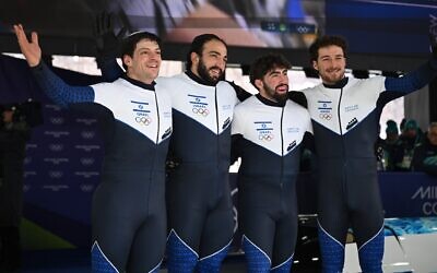 AJ Edelman, Menachem Chen, Uri Zisman and Omer Katz after completing the second run of the four-man bobsled competition at the 2026 Winter Olympics, Feb. 21, 2026, in Cortina, Italy. (Robert Michael/picture alliance via Getty Images)