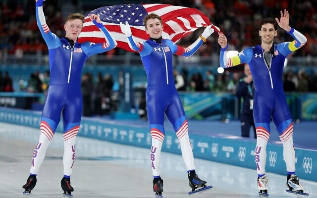 (L-R) Ethan Cepuran, Casey Dawson and Emery Lehman of Team United States celebrate after winning silver in the Speed Skating Men’s Team Pursuit on day eleven of the Milano Cortina 2026 Winter Olympic games at Milano Speed Skating Stadium on Feb. 17, 2026 in Milan. (Jamie Squire/Getty Images)