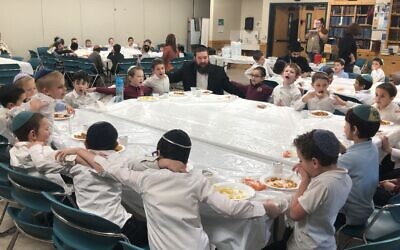 Students celebrate Rosh Chodesh and the start of a new month. (Photo courtesy of Yeshiva Schools of Pittsburgh)
