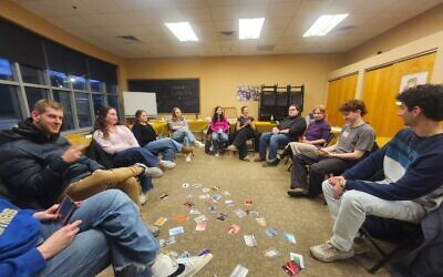 Participants discuss an upcoming Israel visit during a Campus Ambassadors gathering. (Photo courtesy of Hillel JUC)