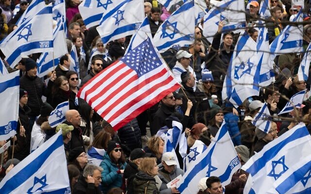 Demonstrators hold US and Israeli flags during a rally in Central Park marking 150 days since hostages were taken in attack on Israel on March 10, 2024 in New York City. (Noam Galai/Getty Images) Demonstrators hold US and Israeli flags during a rally in Central Park marking 150 days since hostages were taken in attack on Israel on March 10, 2024 in New York City. (Noam Galai/Getty Images)