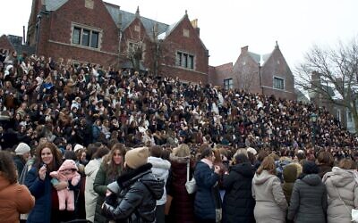 Female emissaries of the  Chabad-Lubavitch movement gather for a group photo in Crown Heights, Brooklyn, on Feb. 6, 2026. (Jewish Telegraphic Agency)