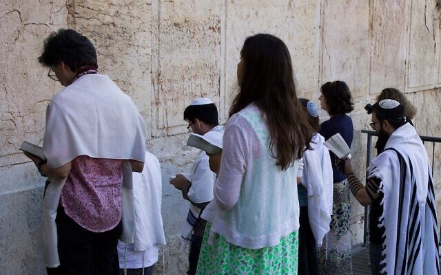 Conservative Jews praying at Robinson's Arch in Jerusalem, July 30, 2014. (Robert Swift/Flash90)