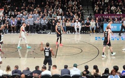 Ben Saraf, Deni Avdija and Danny Wolf share the court during the Portland Trail Blazers-Brooklyn Nets matchup on March 16, 2026. It was the first NBA game to feature three players with Israeli citizenship. (Grace Yagel)