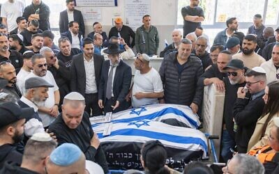 Friends and family attend the funeral of Ronit Elmalich and her mother Sara, who were killed in a missile strike in Beit Shemesh, March 2, 2026. (Yonatan Sindel/Flash90)