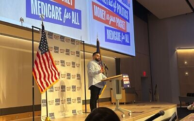 Amir Makled, a pro-Palestinian candidate for University of Michigan board of regents, addresses the crowd at a rally for U.S. Senate candidate Abdul El-Sayed in Ann Arbor, April 7, 2026. Makled, who had praised Hezbollah's leader in a past social media post, bested Jewish incumbent regent Jordan Acker for the state Democratic Party nomination later that month. (Andrew Lapin/JTA)