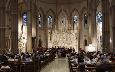 Attendees enjoy a June 8 concert featuring cantors, choirs and other dedicated singers. (Photo by Adam Reinherz)