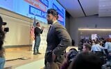 Hasan Piker looks on as U.S. Senate candidate Abdul El-Sayed delivers a stump speech in Ann Arbor, Michigan, April 7, 2026. Piker, a popular Twitch streamer accused of antisemitism, prompted controversy for campaigning with El-Sayed. (Andrew Lapin/JTA)