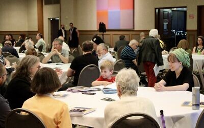 Community members gather at the interfaith event to discuss antisemitism on June 24 (Photo by Octavia Liku)